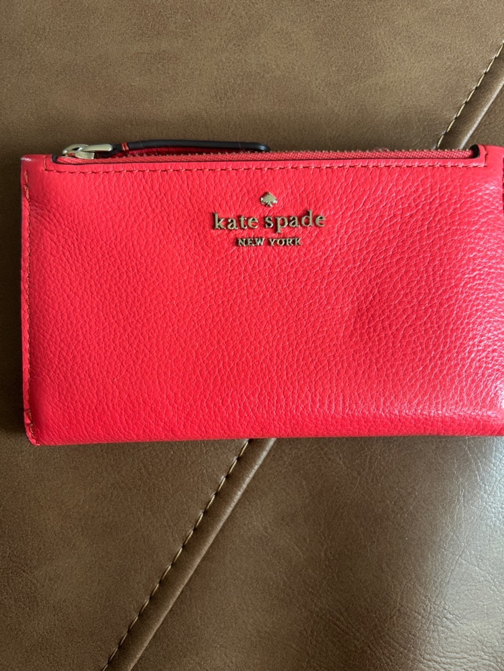 kate spade Coral / Red Pebbled Leather Zip Wallet with Gold Logo